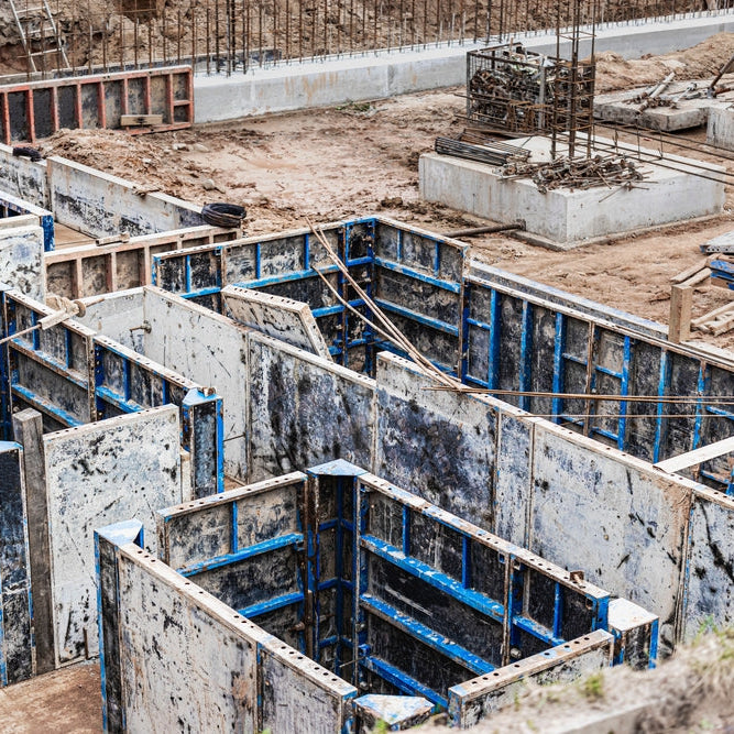 base plate. pit formation of grillage is completed. Forms formwork vertical structures of lower level underground parking. Raft foundation is top pile, pier foundation. Home construction